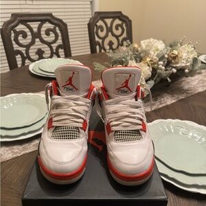 Fire red Jordan 4s
